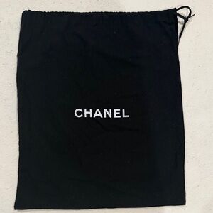 CHANEL Black Drawstring Bag with White Logo